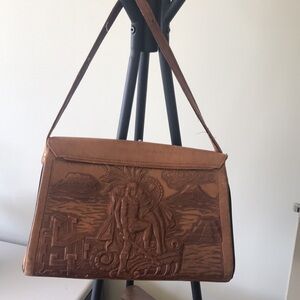 Tooled real leather carved hand bag